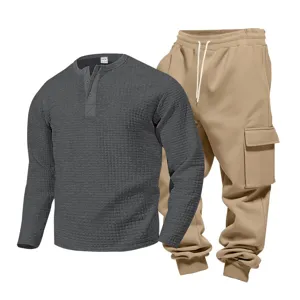 Men waffle long sleeve Henley shirt and khaki cargo sweatpants casual outfit set style.