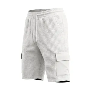 Close-up detail of white waffle knit cargo shorts with side pockets and adjustable drawstring.