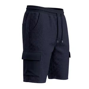 Close-up detail view of men's waffle knit cargo shorts featuring multi pockets and drawstring waist.