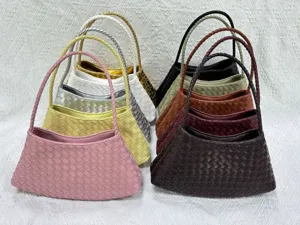 Fashion woven underarm bag single shoulder handbag classic handmade leather design trend.