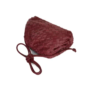 Woven leather cloud crossbody bag for women, stylish shoulder clutch purse with knot strap.