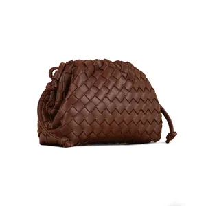 Brown woven leather pouch clutch bag, stylish dumpling crossbody shoulder bag detail.