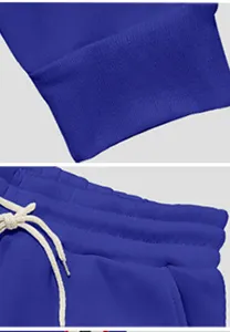 Primo piano dei polsini e della cintura regolabile dei pantaloni della tuta in fleece.