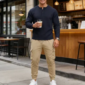 Detailed view of men's casual waffle long sleeve henley shirt and cargo jogger pants set.