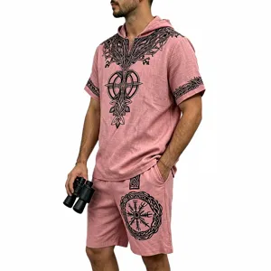 Detailed view of men linen Viking tree hooded short set in pink with black nordic print.