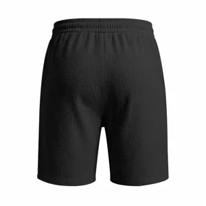 Detailed back view of men's black waffle knit casual sports shorts with elastic waist.