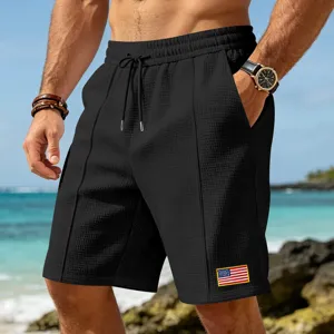 Detailed view of men casual waffle knit shorts with pocket, drawstring waist, beach style.