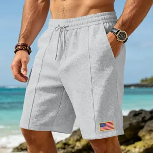 Men's casual waffle knit shorts loose fit summer beach sports shorts with pockets.