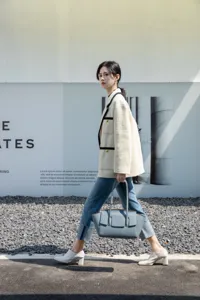 Elegant blue leather tote bag for women, spacious work handbag, chic daily shoulder bag.