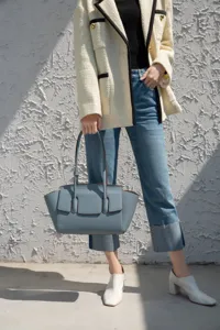 Elegant women leather tote shoulder bag, stylish casual daily handbag with unique design.