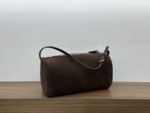 Brown suede 90s barrel shoulder bag, stylish minimalist daily handbag for women and girls.
