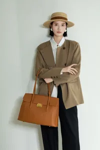 Premium top layer cowhide commute bag, vintage large capacity leather briefcase for women.