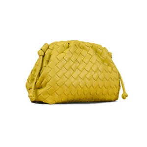 Yellow woven leather pouch clutch bag stylish dumpling handbag for women daily chic accessories.