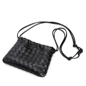 Black woven leather crossbody bag with drawstring closure for women stylish fashion