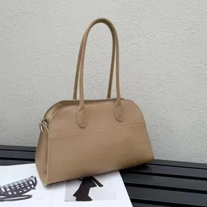 Elegant beige pebble leather tote bag with long handles, chic women's shoulder handbag