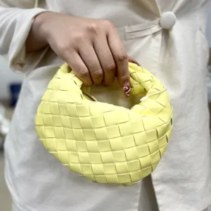 Yellow woven leather handbag for women minimalist fashion top handle woven pouch bag trend style