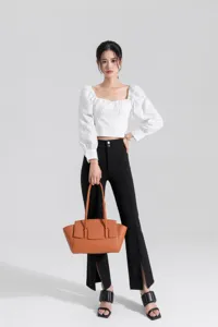 Chic leather tote bag for women, elegant brown shoulder bag with spacious design for daily commute.