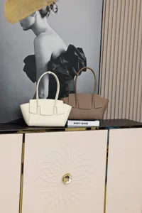Premium leather shoulder tote bag detail view, elegant minimalist design for modern women.