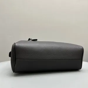 Dark grey leather bowling handbag detail view, premium cowhide top layer design for women.