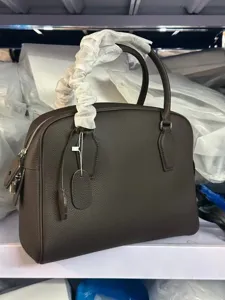 Classic top layer cowhide bowling handbag, large capacity versatile leather tote bag.