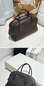 Dark brown leather bowling bag for women, classic top handle tote with premium cowhide.