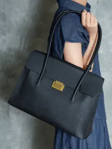 Black leather tote bag with metal lock, large capacity shoulder work bag for women.
