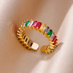 Macro view of adjustable 18K gold plated ring featuring colorful baguette zircon stones