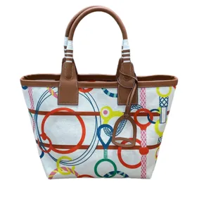 Colorful canvas tote bag with leather handles and equestrian print for daily fashion use.