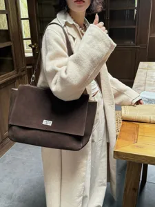 Brown suede tote bag for women, large capacity shoulder bag with flap and metal lock closure.