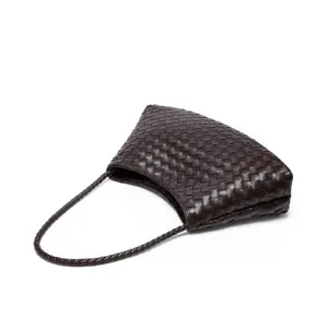 Dark brown woven leather shoulder bag, stylish handmade underarm bag for women daily fashion use.