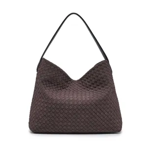 Brown suede woven shoulder bag for women, large capacity casual tote and hobo bucket bag style.