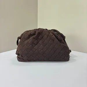 Brown woven leather clutch bag for women, stylish vintage soft pouch designer handbag.