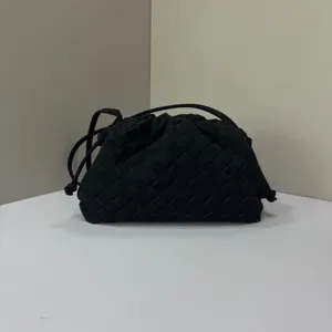 Black woven pouch bag, vintage leather clutch and stylish crossbody handbag for women.