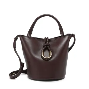 Dark brown leather bucket bag detail showing braided handle ring buckle and shoulder strap.