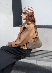 Brown suede underarm shoulder bag for women, minimalist genuine leather casual daily purse.