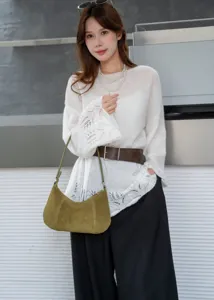 Minimalist olive green suede underarm shoulder bag for women, stylish autumn winter fashion.