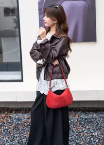 Stylish red suede underarm shoulder bag for women, minimalist autumn winter chic handbag.