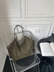 Casual large capacity suede tote bag for women, stylish slouchy shoulder bag daily use.