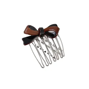 Sweet acetate bow hair comb, stylish two-tone hair accessory for women and girls daily use.