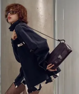Vintage leather messenger bag for women, retro motorcycle shoulder crossbody bag with metal lock.