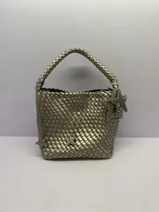 Metallic silver woven bucket bag with stylish star charms, large capacity casual shoulder bag.