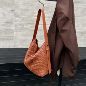 Handmade woven leather shoulder bag, large capacity relaxed underarm tote bag for women.