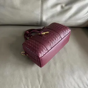 Burgundy leather woven Boston handbag, classic retro style casual shoulder bag for women.