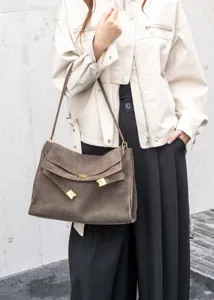 Vintage suede shoulder tote bag for women, luxury leather commuter handbag, stylish design.
