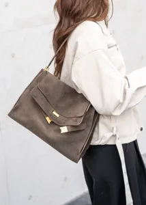 Suede leather shoulder bag for women, large capacity retro commute tote with metal lock.