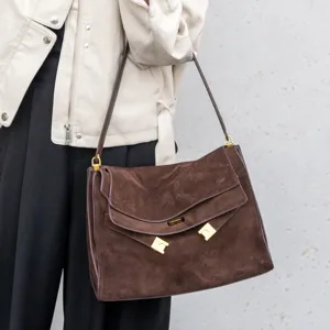 Vintage brown suede shoulder bag for women, luxury style commuter tote bag with metal hardware.