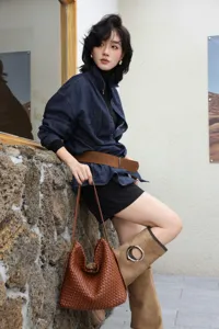 Handmade woven leather hobo bag for women, large capacity stylish shoulder tote detail view.