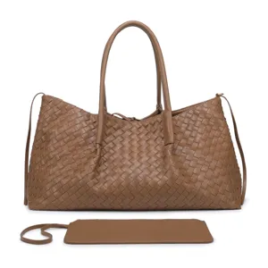 Brown woven leather tote bag detail, large capacity handbag craft and matching pouch design.