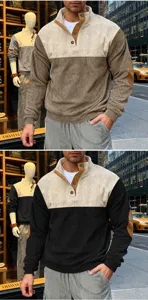 Men's colorblock corduroy stand collar long sleeve sweatshirt detail view in urban street setting.