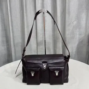Retro genuine leather messenger bag with multiple pockets and metal clasps for daily use.